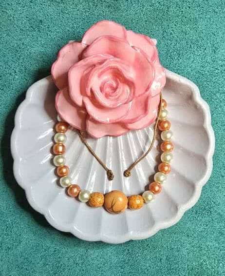 دستبند مرواریدی نارنجی رنگ